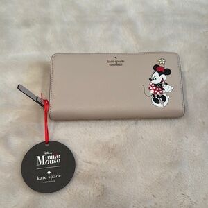 Kate Spade Cream Wallet with Playful Design